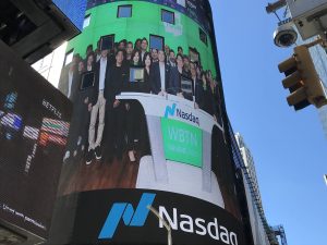 WEBTOON going public as shown on the NASDAQ building in Time's Square