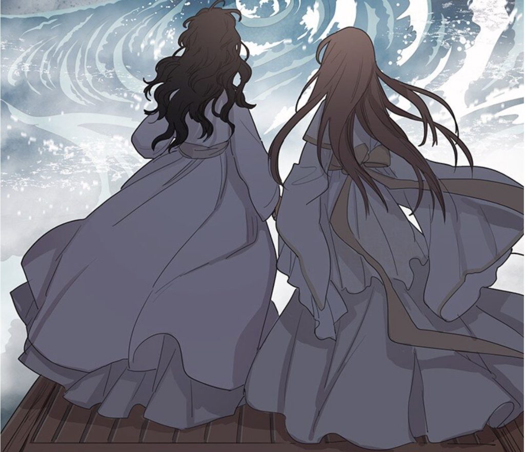 two women in white dresses, one with black hair and one with brown hair, holding hands in front of churning ocean