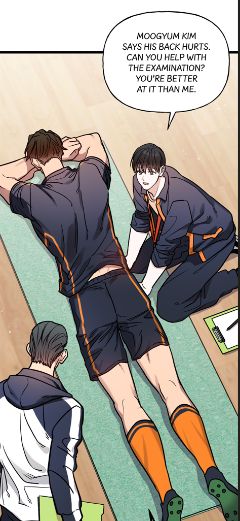 moogyum lying face down on a yoga mat while hajoon asks for assistance in helping him