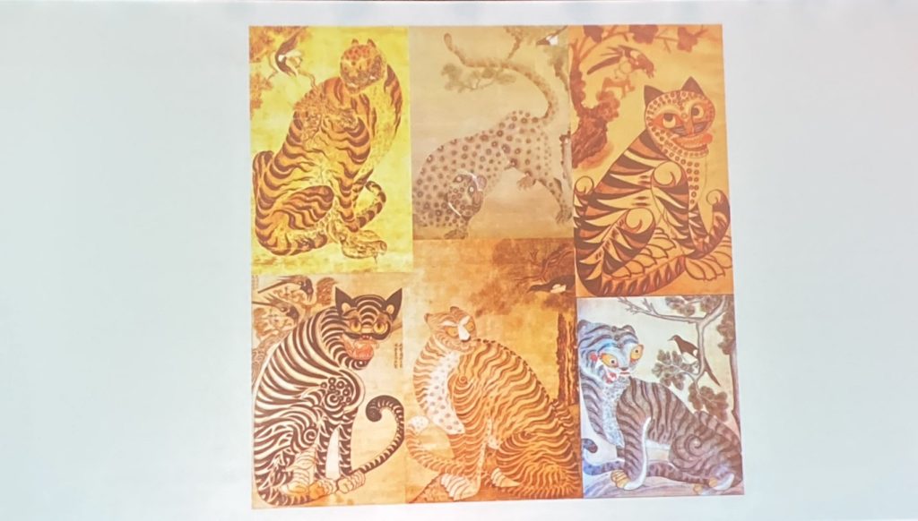 A slide of various hojakdo images, depicting the tiger and the magpie together.