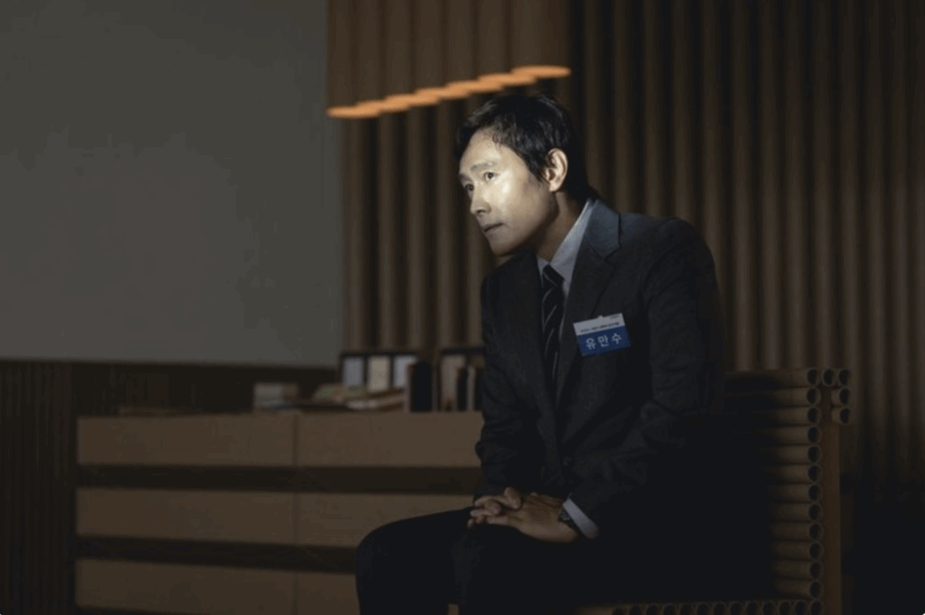 Lee Byung-hun sits in the spotlight in No Other Choice