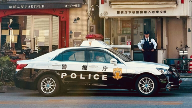 Japanese police car photo by Christiaan de Groot via Unsplash