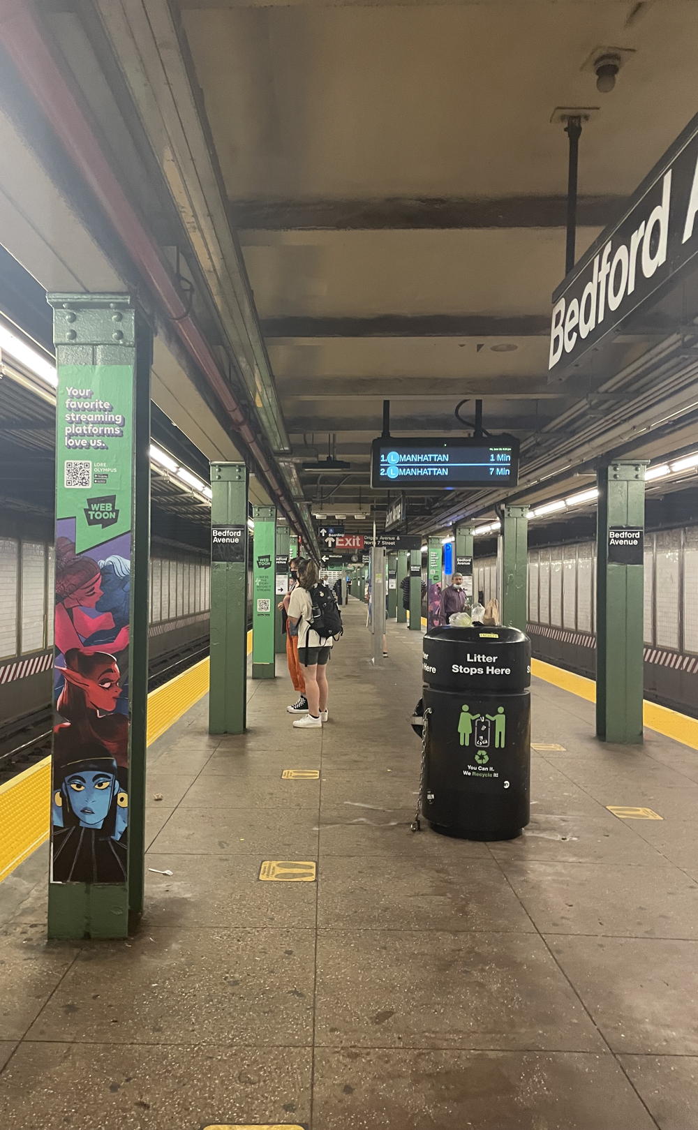 photo of webtoon ads at bedford station in nyc