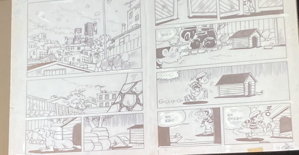 Two pages from Lee Sangmoo's "Pidgeon Chorus," depcting a young boy walking by a doghouse.