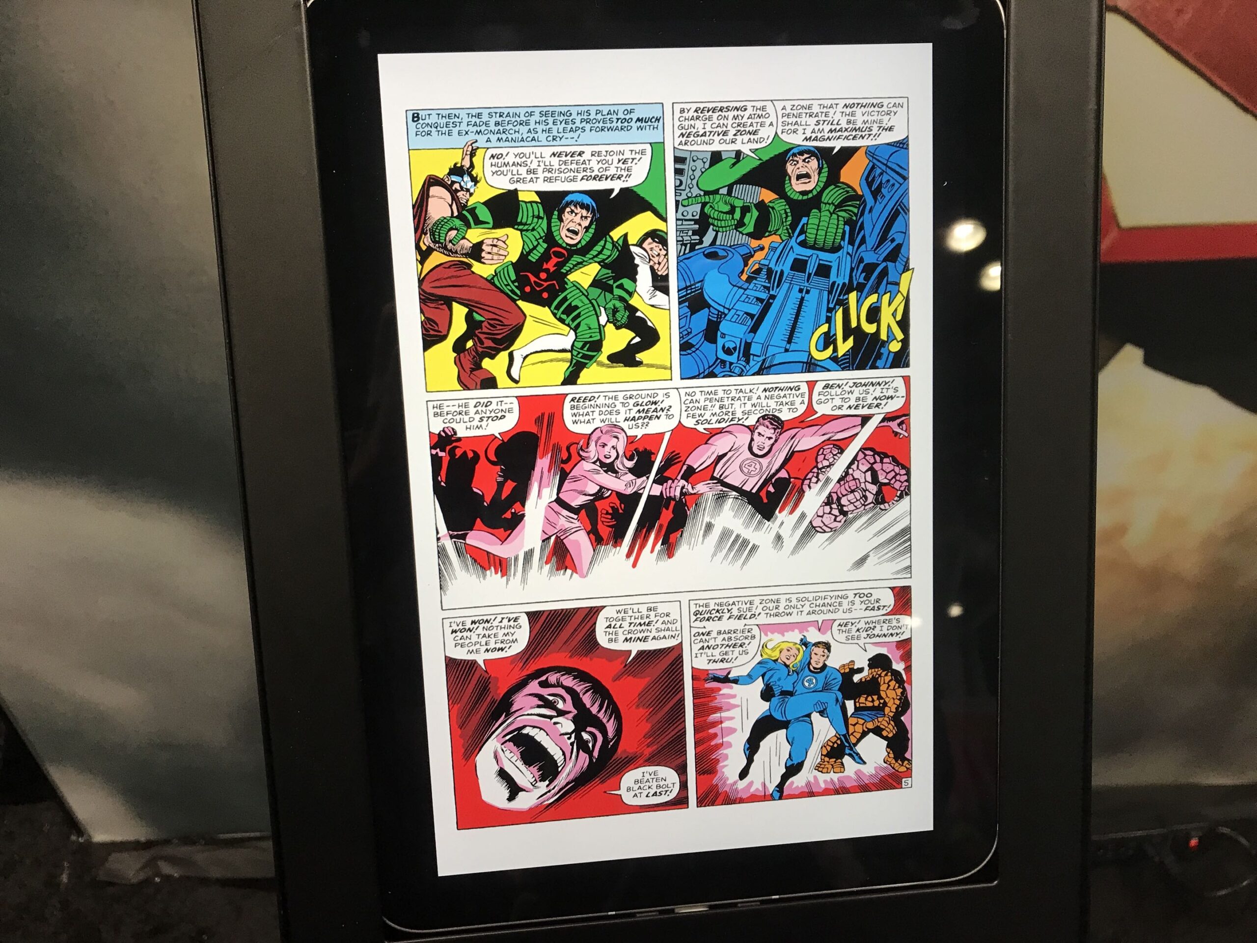 a photo of a display kiosk with the Marvel Comics app showing a page from the classic Fantastic Four comics. The full page in full view of the display.