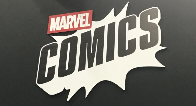 the logo for the Marvel Comics app against a black backdrop seen at the official booth during New York Comic Con '26.